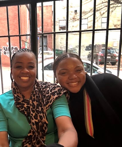 Paradigm Shifters mentor and participant smiling together